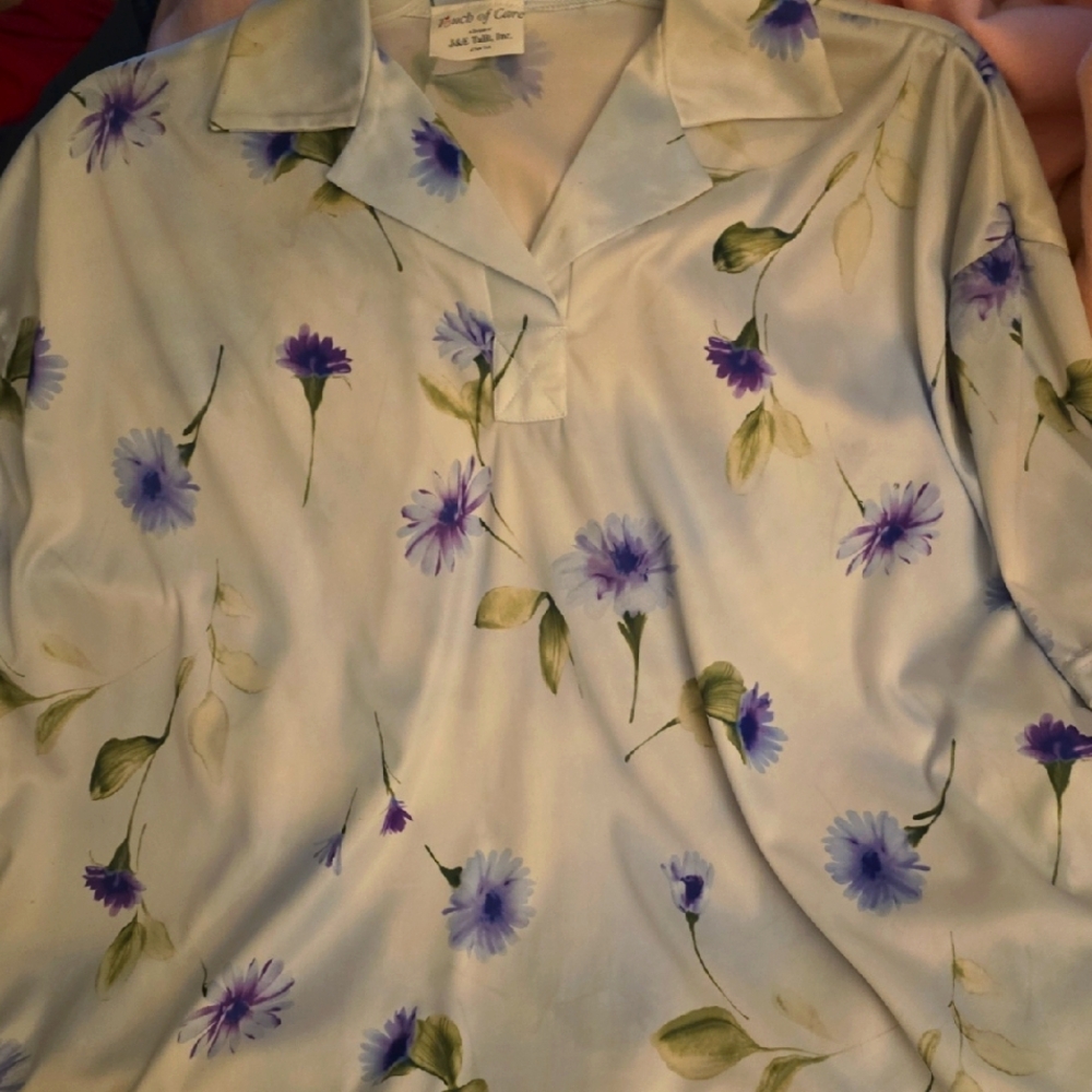 Floral Print Blouse with Purple Flowers On Light Blue Background